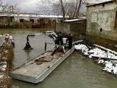 Крокуючий екскаватор павук Кайзер на понтоні