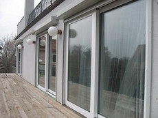 «Теплі» алюмінієві розсувні двері ALUMIL (Греція)