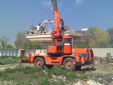 Крокуючий екскаватор павук Кайзер на понтоні