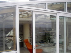 «Теплі» алюмінієві розсувні вікна REYNAERS, ALUMIL