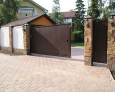 Зсувні ворота - зручний варіант для дому