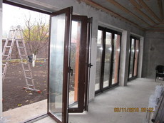 Алюмінієві двері типу «гармошка» REYNAERS (Бельгія)