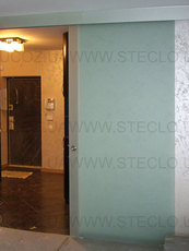 Розсувні скляні двері