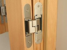 Приховані дверні петлі Tectus Simonswerk (Німеччина).