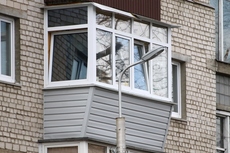 Обшивка балкона сайдингом в Києві