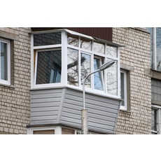 Обшивка балкона сайдингом в Києві
