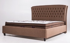 Ліжко з м'яким узголів'ям